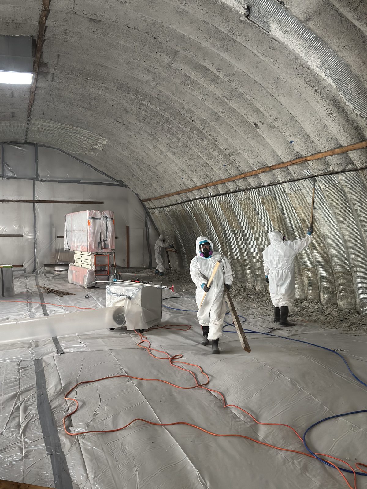Containment and negative air in a steel structure