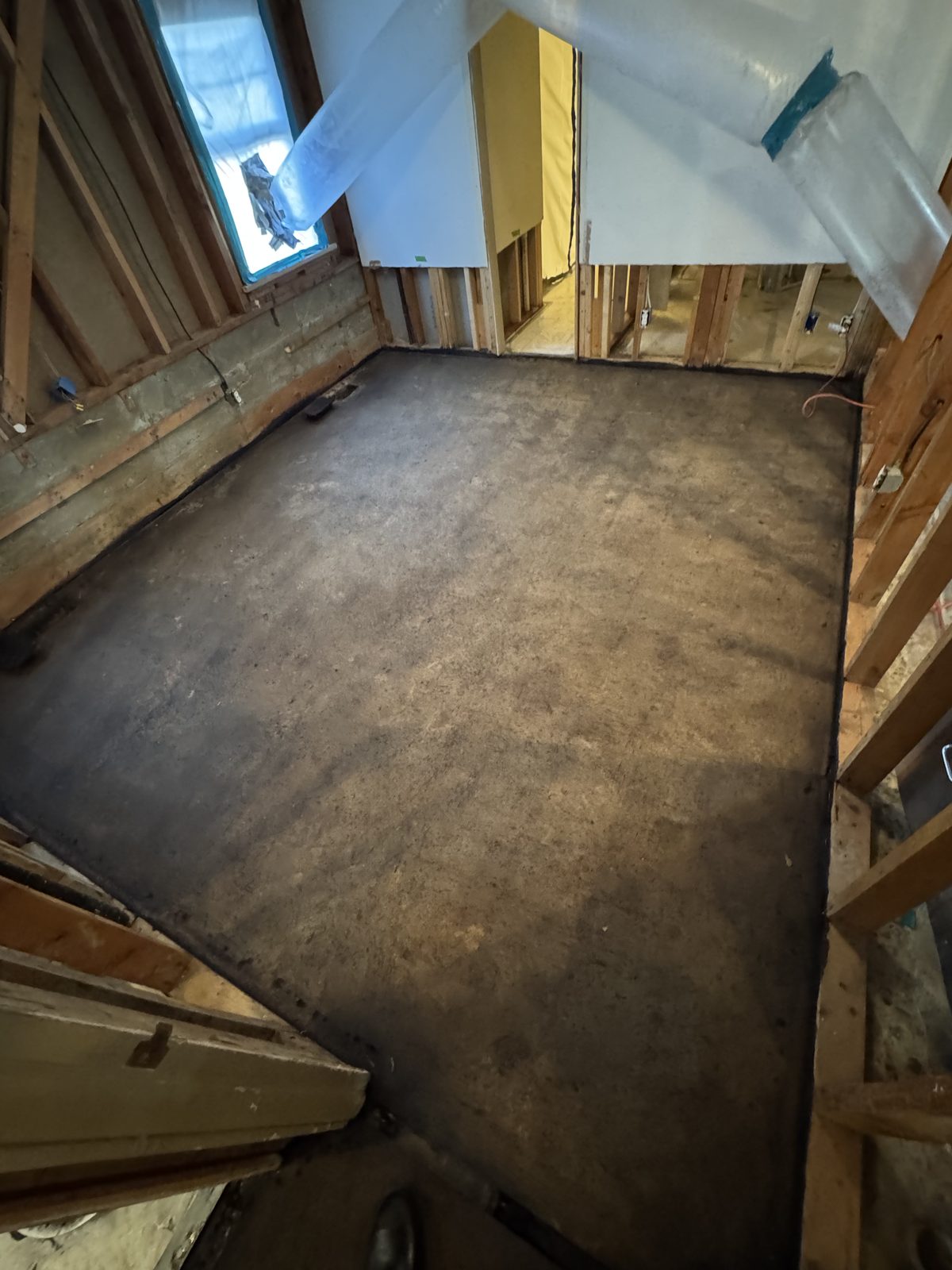 Slab cleaned down after flooring and mastic removal