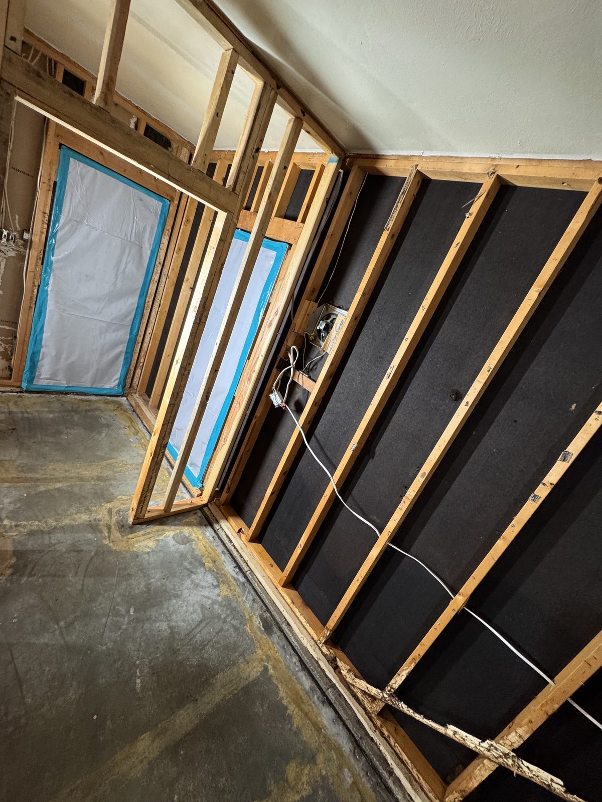 Containment sealed at the window and door openings