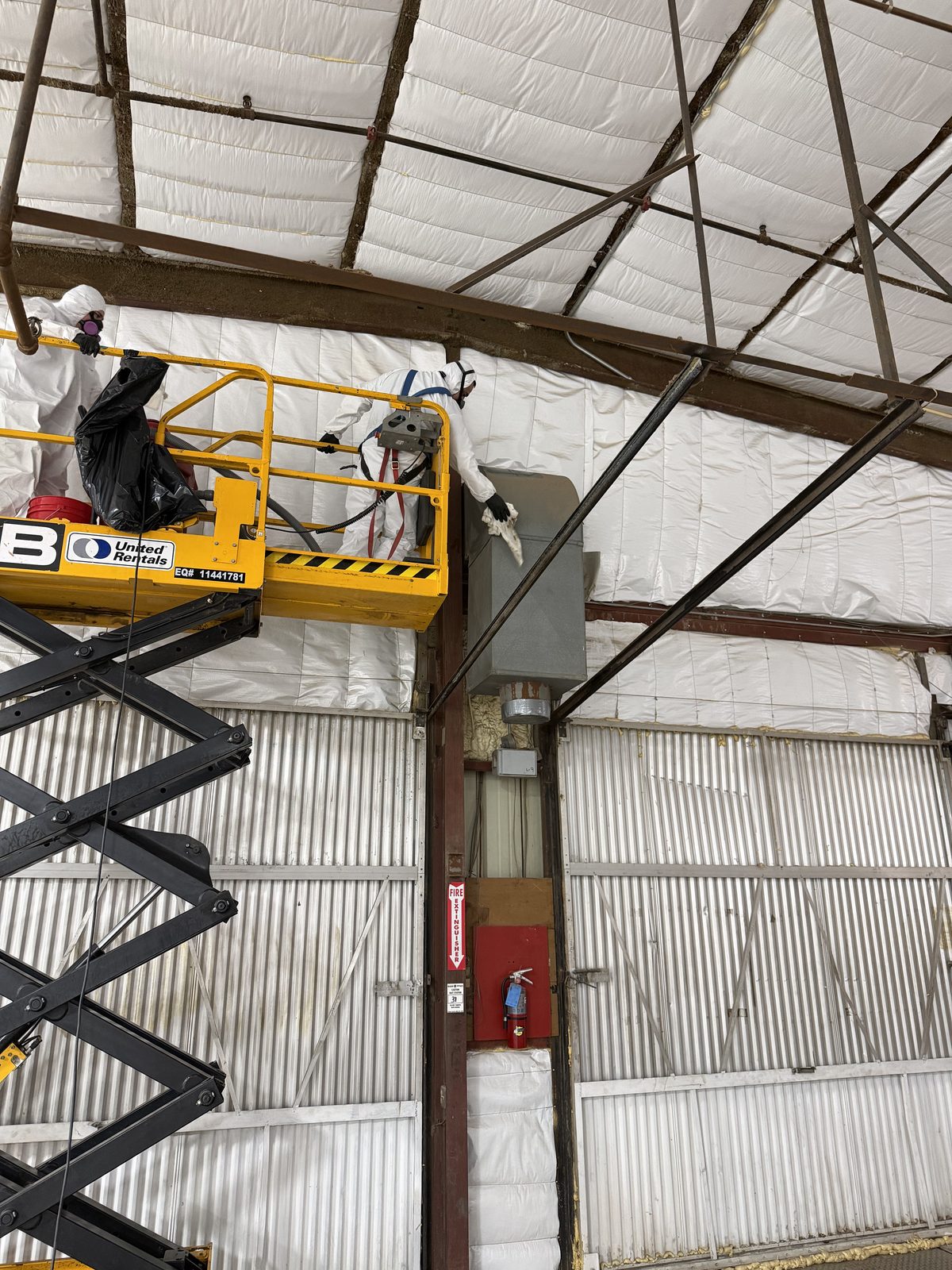 Crew working the structure overhead in PPE