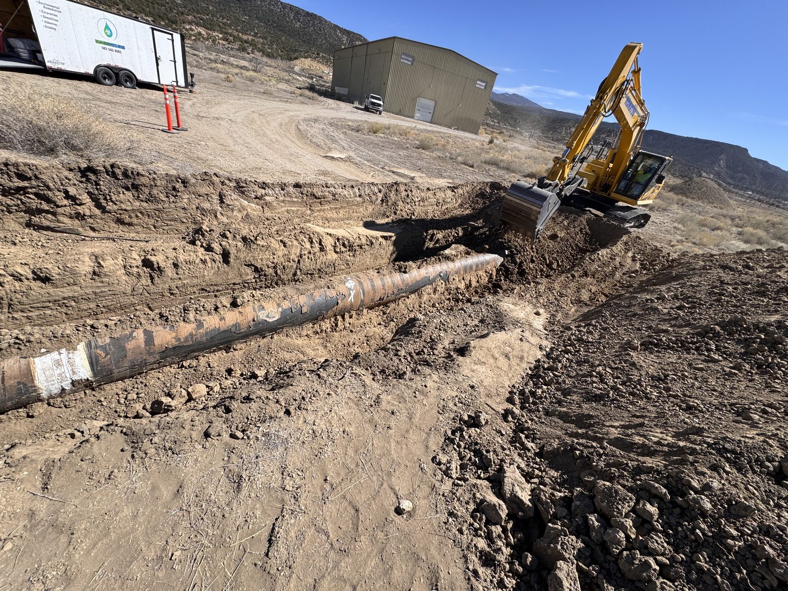 Asbestos cement pipe exposed the length of the cut